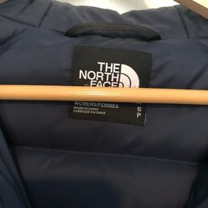 North face blue puffy jacket